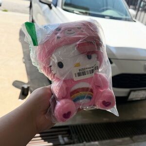 Cute Pink Plush Toy with Rainbow Accents